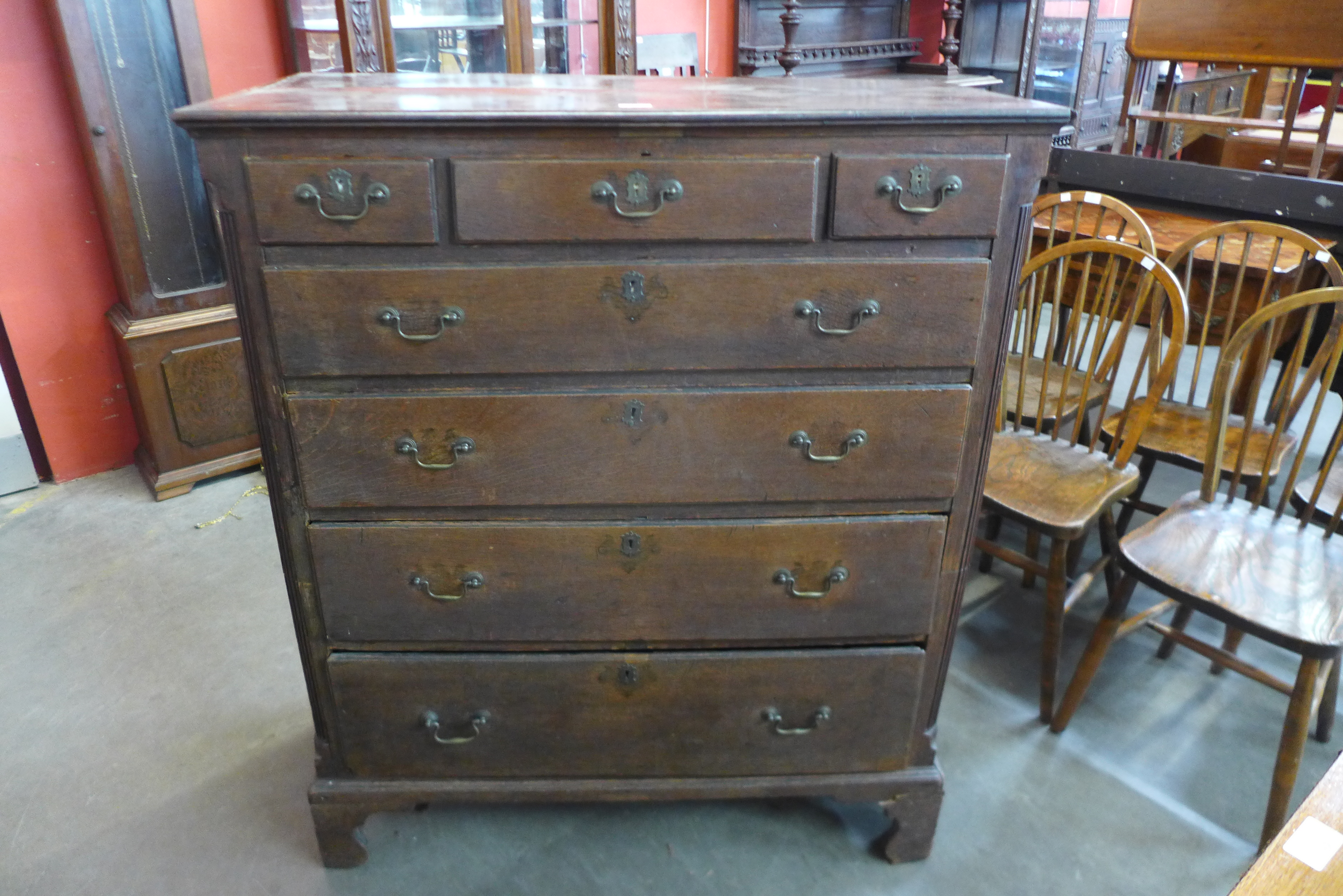 A George II oak chest of drawers