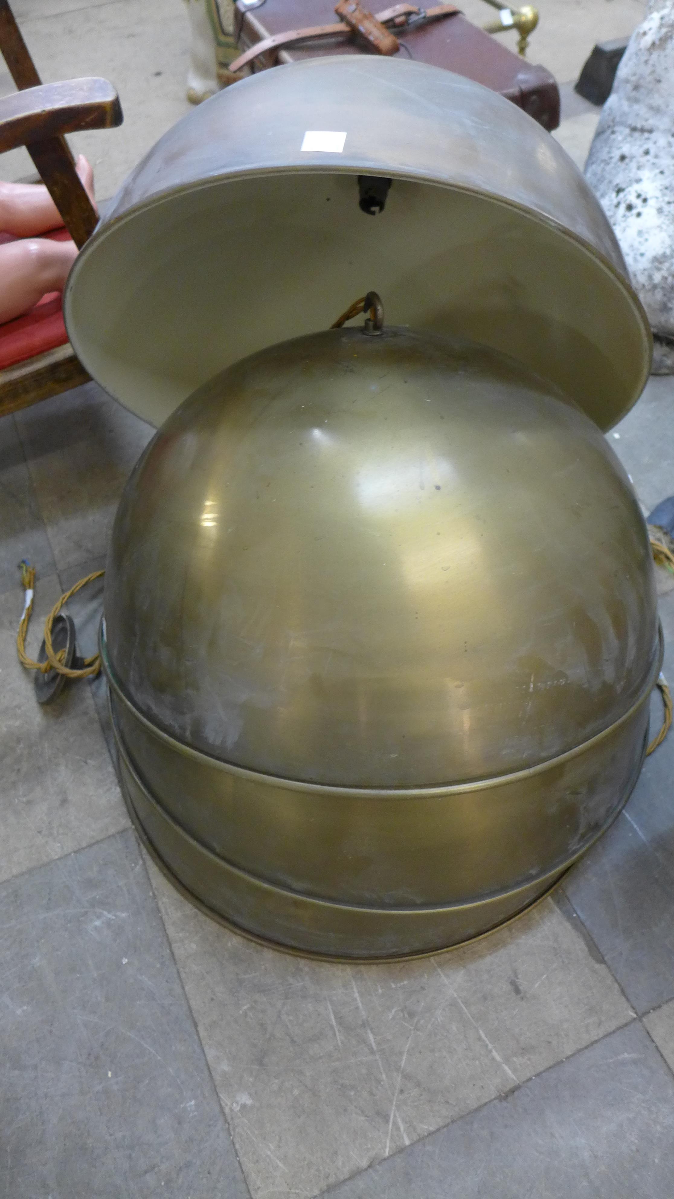 A set of four brass and enamelled industrial ceiling lights