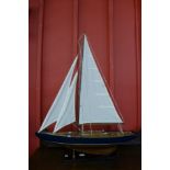 A scale model of a fully rigged yacht