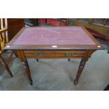 A late Victorian mahogany writing table