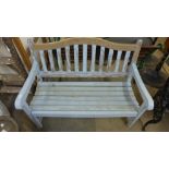 A painted wooden garden bench