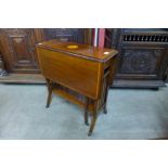 A Victorian inlaid mahogany Sutherland table