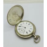 A silver cased Zenith full-hunter pocket watch, case back dented, lacking glass