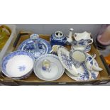 A collection of blue and white china including five ladles, bowls, small jugs and a gravy boat, some