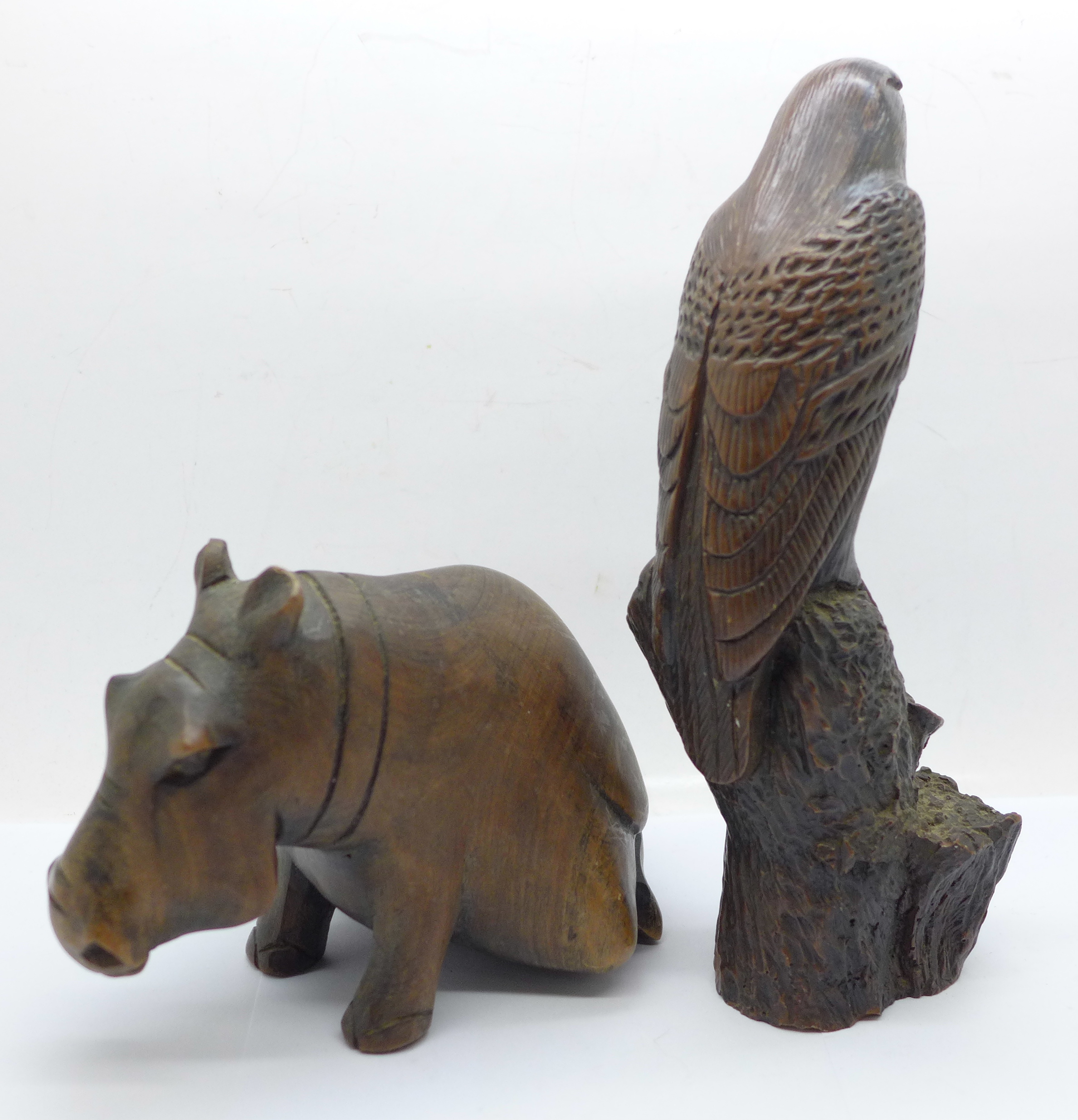 A carved wooden hippopotamus and a resin hawk - Image 2 of 4