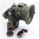 A Lucas acetylene gas bicycle lamp with rear light and reflector