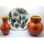 Two Flora Gouda Holland Tokio vases and a Jersey pottery dish