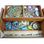 A jewellery case and costume jewellery