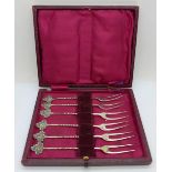 A set of six silver olive forks, boxed, 44g