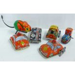 Six tin plate clockwork toys