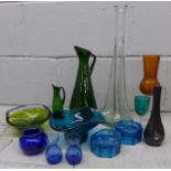 A collection of coloured glassware including jugs, bowls, etc. **PLEASE NOTE THIS LOT IS NOT