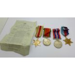 A set of four WWII medals to W153189 C.W. Davies, with slip