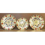 Two Royal Crown Derby Old Imari dinner plates, 27cm, and a side plate, 21.5cm, second quality