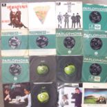 Twenty Beatles and Beatles solo 7" vinyl singles and EP's