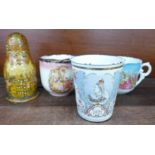 Two Victorian moustache cups, a Russian doll and a Victorian commemorative mug