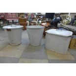 An enamelled bread bin and two enamelled bins