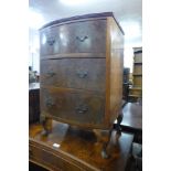 A small burr walnut bow front chest of drawers