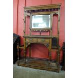 A large Victorian Aesthetic Movement carved oak hallstand