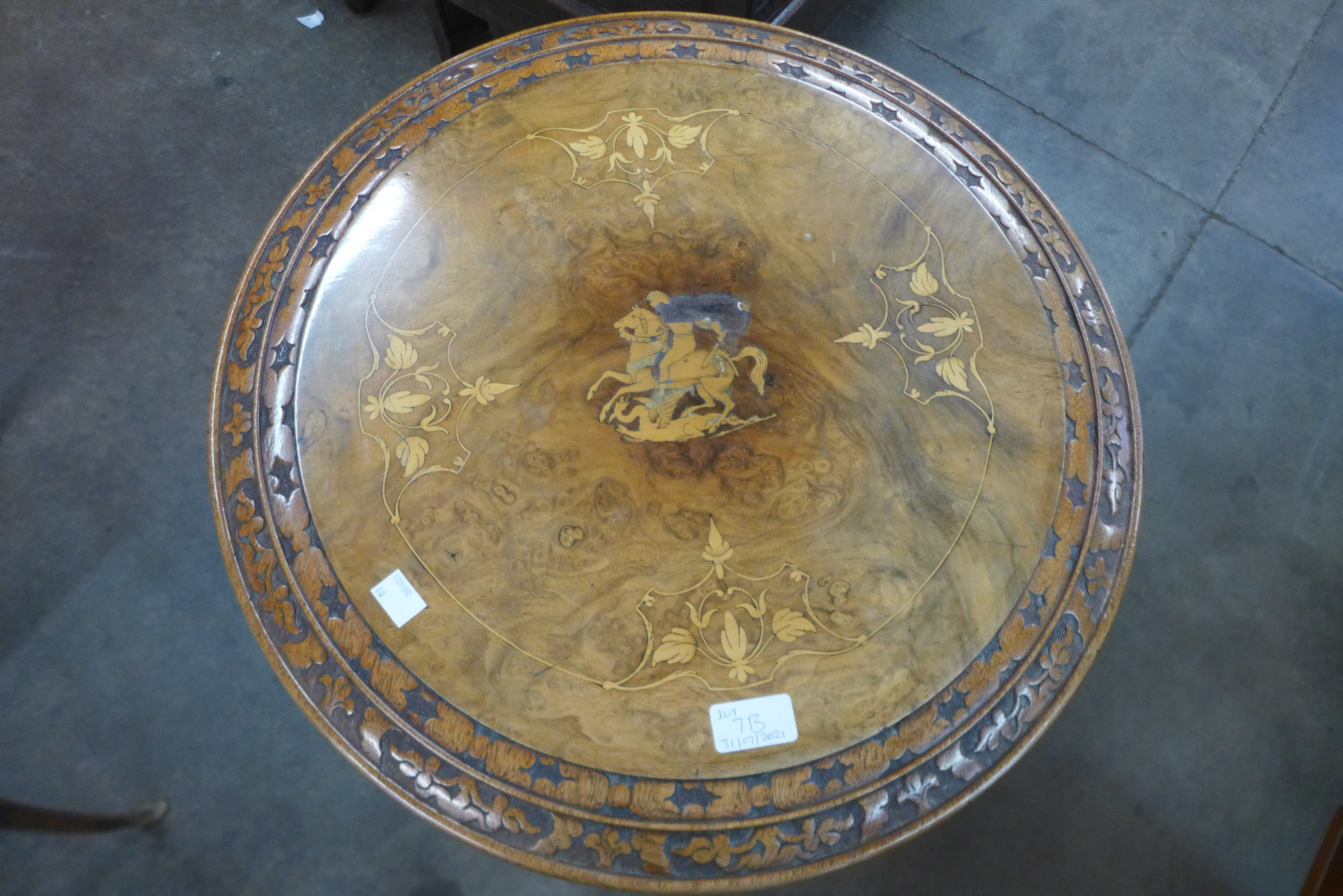 A Victorian carved walnut and marquetry inlaid tripod table - Image 2 of 2