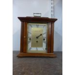 A Franz Hermle & John Westminster chime mahogany mantel clock