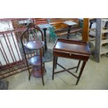 A mahogany cakestand and a side table