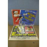 A Stan Laurel and Oliver Hardy film poster and a James Dean, East of Eden film poster, unframed