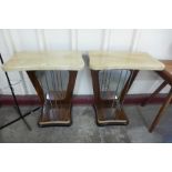 A pair of Art Deco style simulated rosewood and faux marble topped console tables