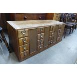 An oak double sided index drawer cabinet