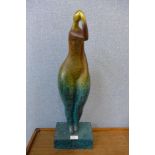 An abstract bronze figure of a lady