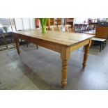 A large pine farmhouse kitchen table