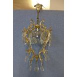 A gilt metal and glass chandelier