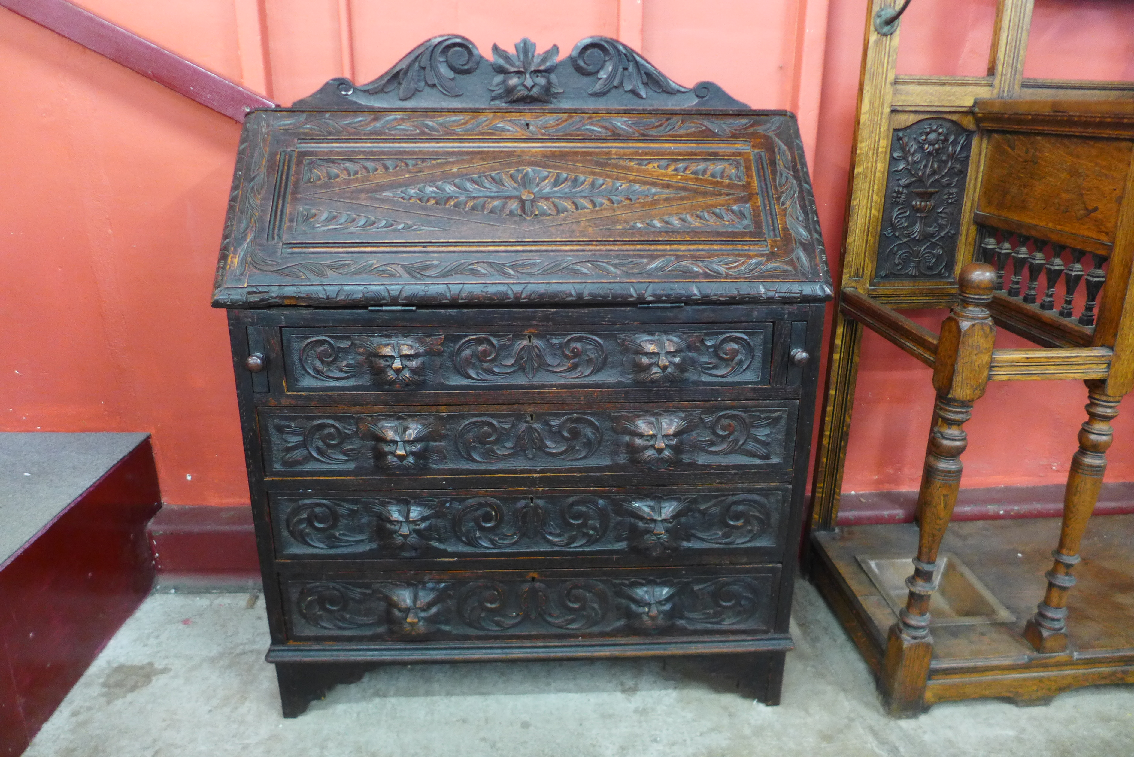 A Victorian Jacobean Revival carved oak bureau - Image 2 of 3