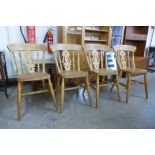 A set of four beech kitchen chairs