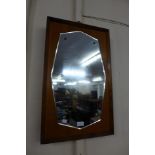 A teak framed mirror