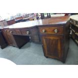 A large George IV mahogany breakfront serving table