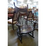 A 19th Century American carved oak rocking chair