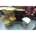 An oak open bookcase, an Edward VII inlaid mahogany chair and two other chairs