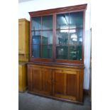 A large Victorian pine country house gun cabinet