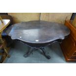 A 19th Century French rosewood two drawer serpentine centre table