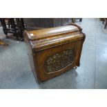 A Victorian figured walnut Canterbury