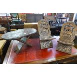 Two African carved hardwood stools and a table