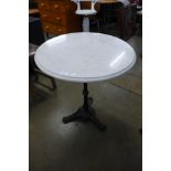 A marble topped cast iron pub table