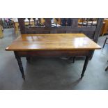 A Victorian pine kitchen table