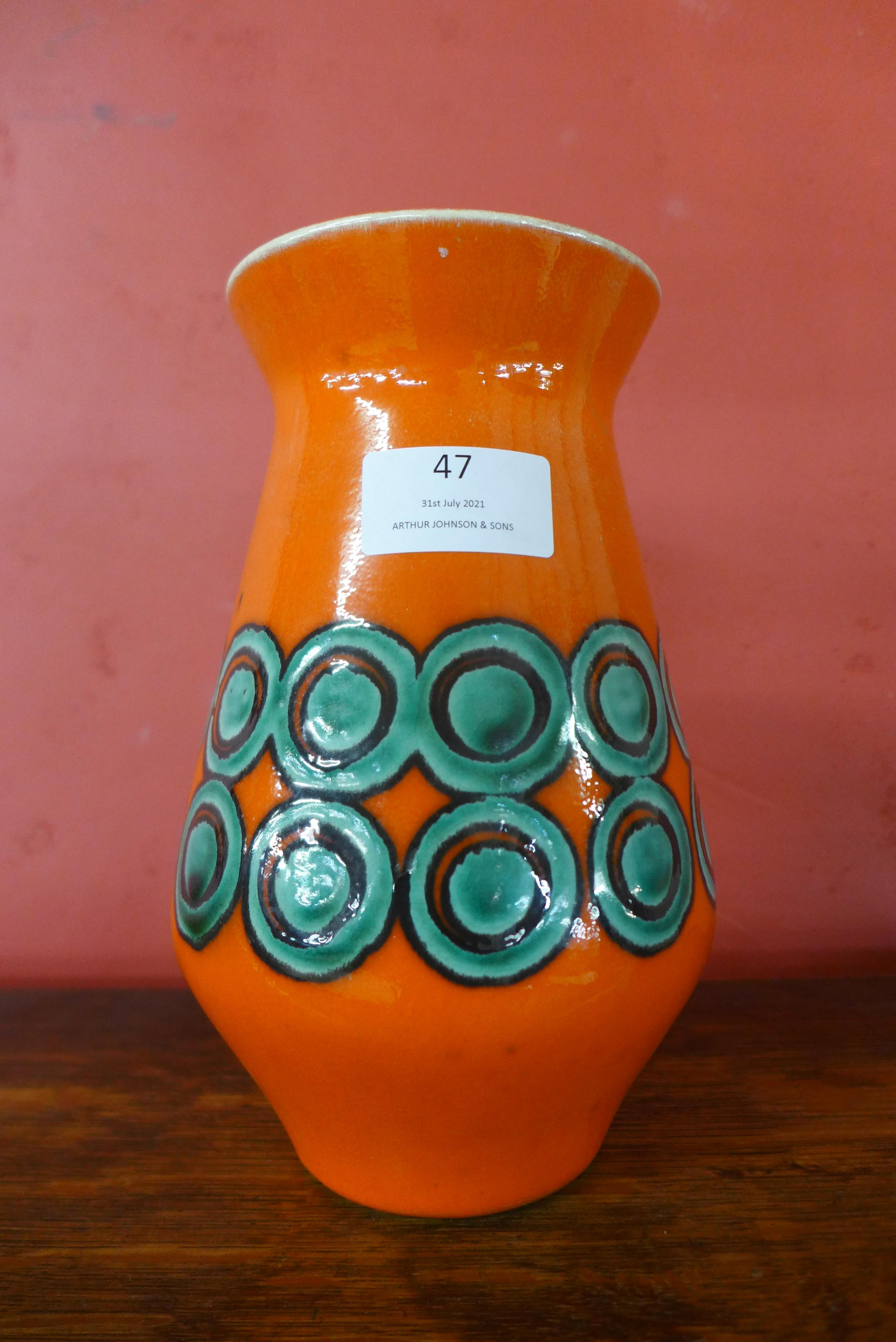 A West German porcelain vase, 20cms h