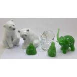 Two Lladro seated polar bear figures, a Wedgwood glass bird, a glass elephant, a jade elephant,