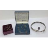A Celtic St. Justin pewter neck chain, three Runic rings and a hallmarked silver snake arm bangle,