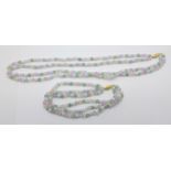 A stone bead necklace and matching bracelet with 14ct gold clasps