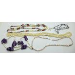 Three freshwater pearl necklaces with silver clasps, one other coloured freshwater pearl necklace