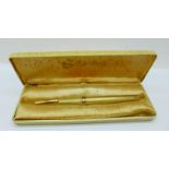 A rolled gold Sheaffer fountain pen with 14ct gold nib, cased