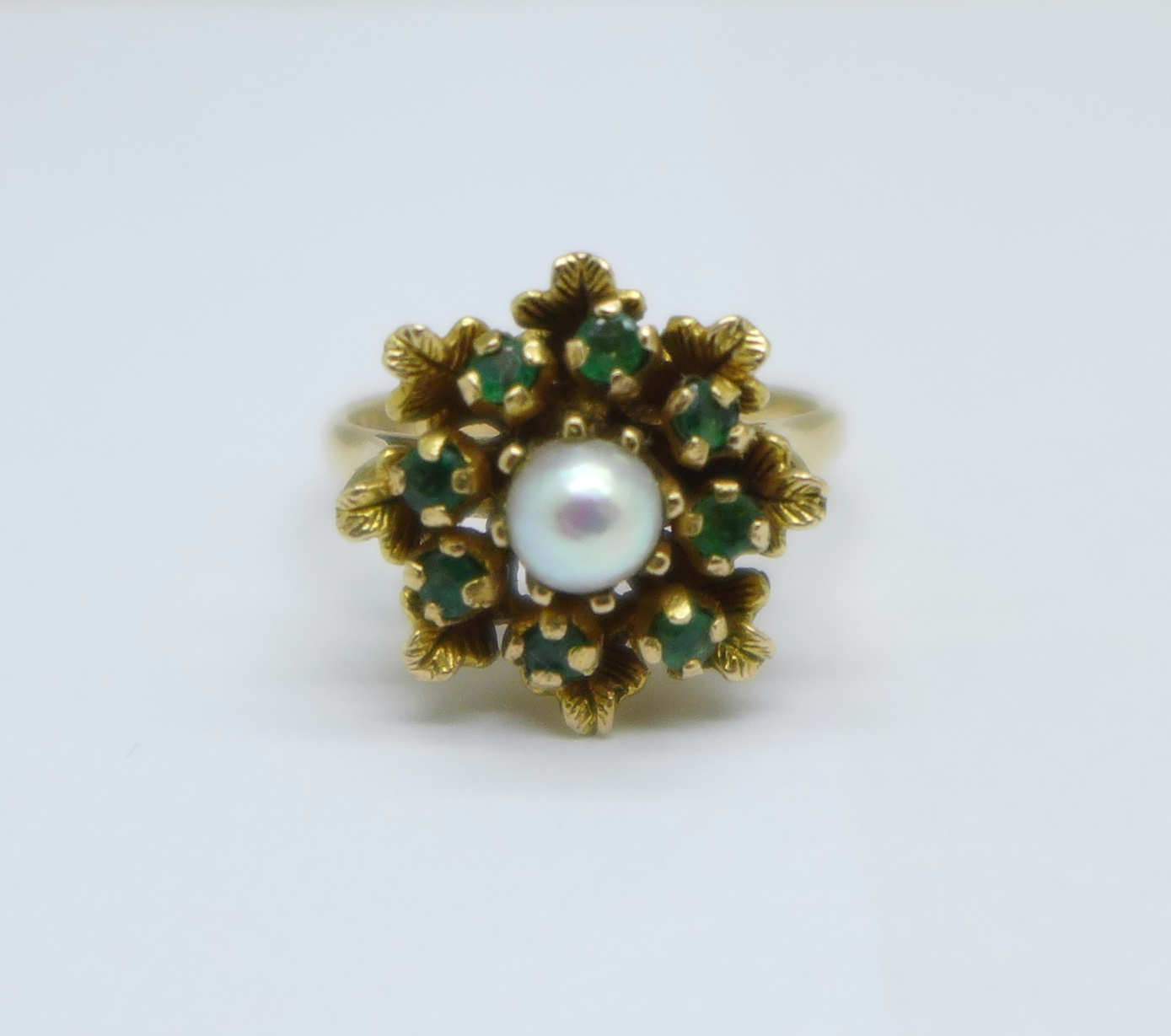 A 9ct gold, pearl and emerald ring, 4.8g, M